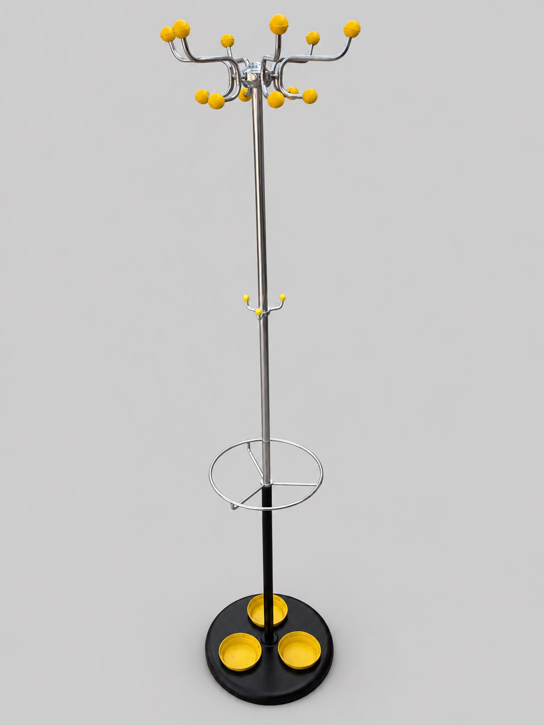 Chrome coat stand with yellow ball hooks